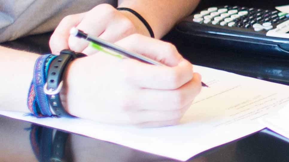 hand writing on paper